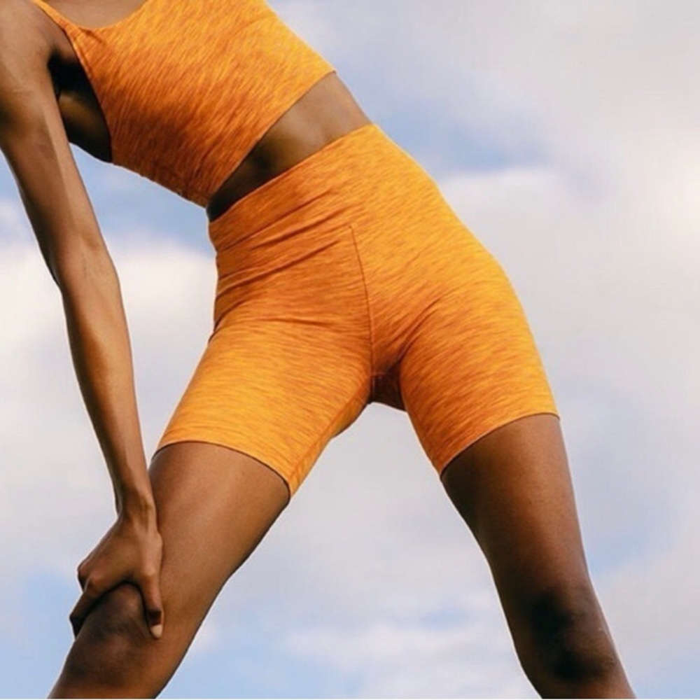 Outdoor Voices orange 7” flow shorts